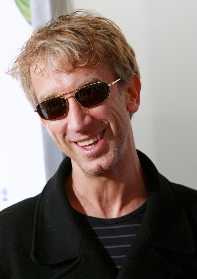 Actor Andy Dick poses for photographers at the premiere of "Happily N'Ever After" in Los Angeles December 16, 2006. REUTERS/Gus Ruelas
