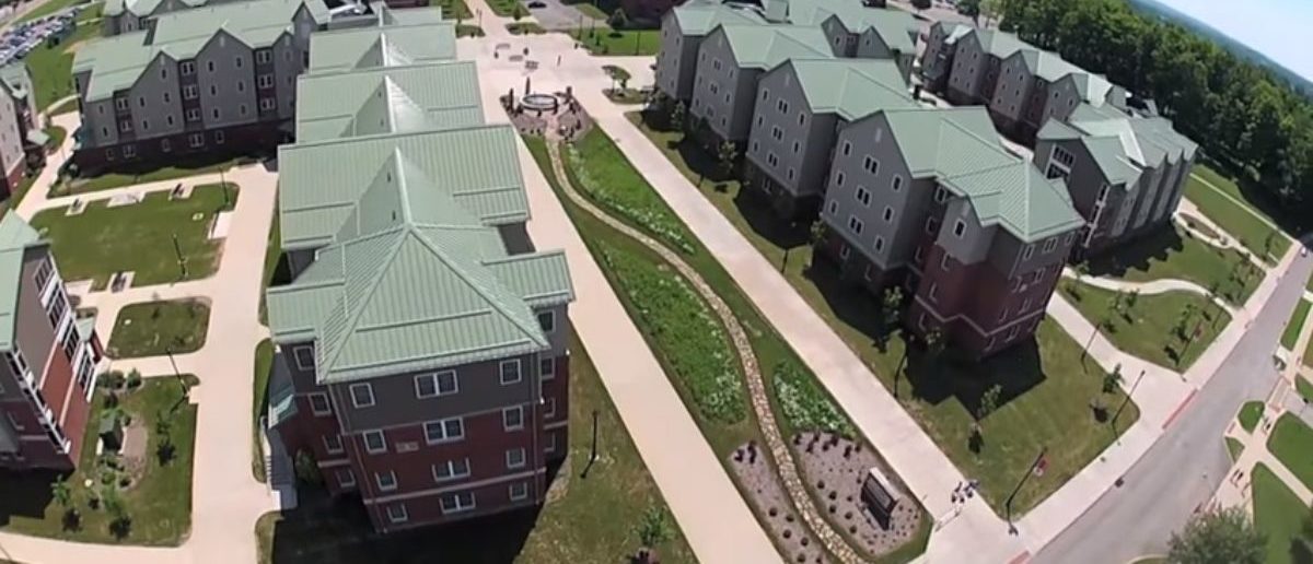 Featured is an aerial view of Edinboro University of Pennsylvania. (Photo Credit: YouTube/Drumheller Creative)
