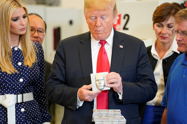 U.S. President Donald Trump and White House senior advisor Ivanka Trump tour the advanced manufacturing lab at Northeast Iowa Community College in Peosta, Iowa, U.S., July 26, 2018. REUTERS/Joshua Roberts