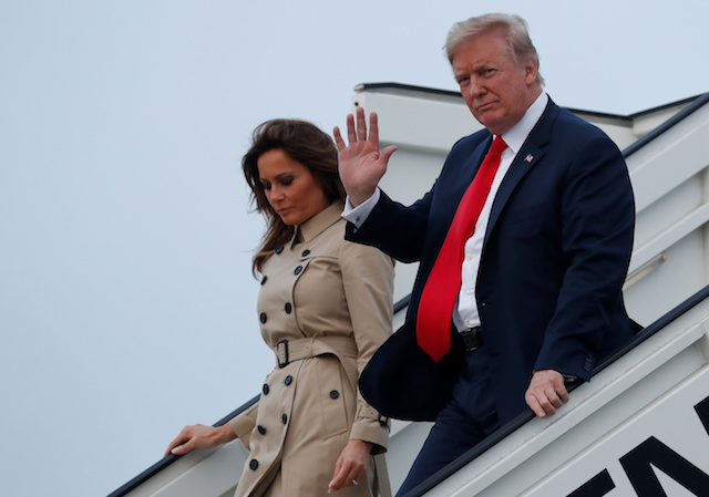 U.S. President Donald Trump and first lady Melania Trump arrive aboard Air Force One ahead of the NATO Summit, at Brussels Military Airport in Melsbroek, Belgium July 10, 2018. REUTERS/Kevin Lamarque