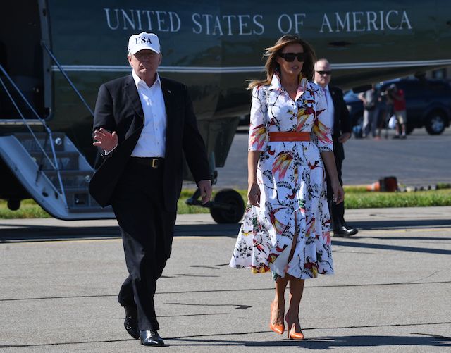 US President Donald Trump and First Lady Melania Trump arrive at Morristown Municipal Airport in Morristown, New Jersey, July 8, 2018 prior to boarding Air Force One following a weekend in Bedminster, New Jersey. (Photo credit: JIM WATSON/AFP/Getty Images)