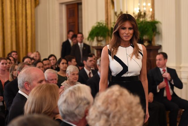 US First Lady Melania Trump arrives for the US president's announcement of his Supreme Court nominee in the East Room of the White House on July 9, 2018 in Washington, DC. (Photo credit: SAUL LOEB/AFP/Getty Images)