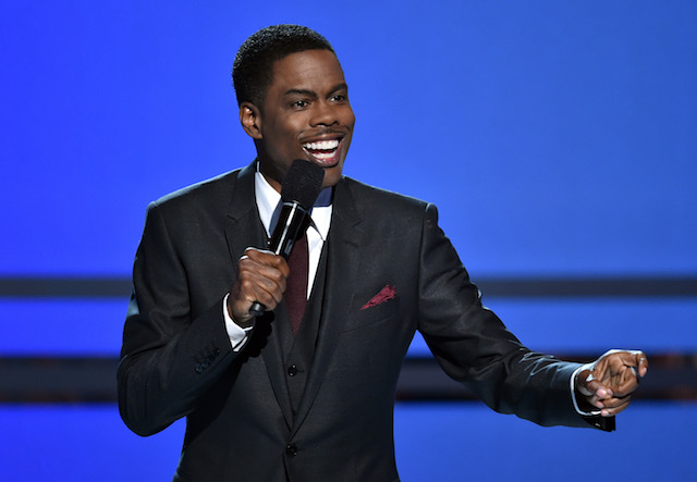 Host Chris Rock speaks onstage during the BET AWARDS '14 at Nokia Theatre L.A. LIVE on June 29, 2014 in Los Angeles, California. (Photo by Kevin Winter/Getty Images for BET)