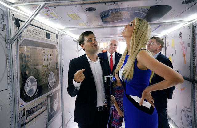Astrobotic Technology CEO John Thornton shows off a mock up of the International Space Station as he gives Ivanka Trump a tour of the facility in Pittsburgh, Pennsylvania, U.S., August 14, 2018. REUTERS/Jason Cohn 